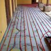 Outdoor patio heating over blue board insulation